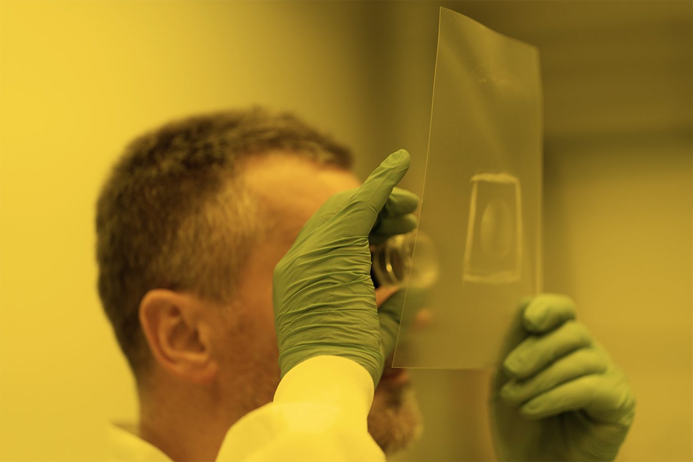 A 3D AG employee Inspecting a UV polymer strucutre